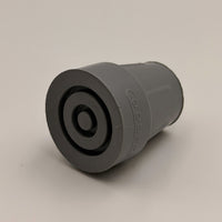 Coopers walking stick ferrule, heavy-duty plastic with concentric circles and reinforced tip, plain background, close-up view.