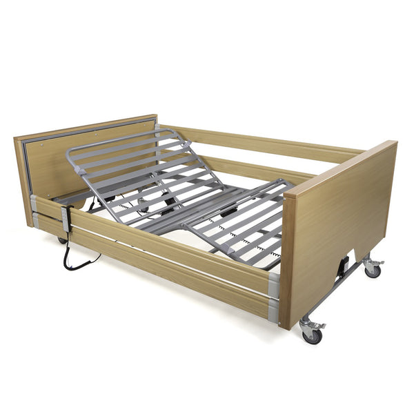 Harvest Healthcare Woburn Community 1200 bed with adjustable head section and castor wheels, wooden frame, front angle view.