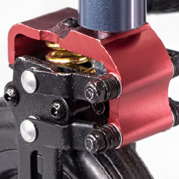 Clamp with bolts on Urathon Yo-Yo Full Suspension Wheelchair, gold springs visible inside, close-up view.